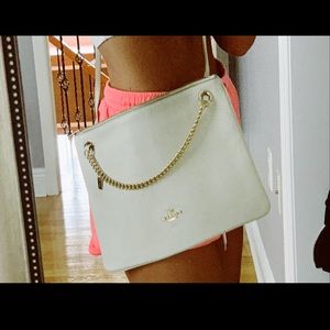 coach over the shoulder